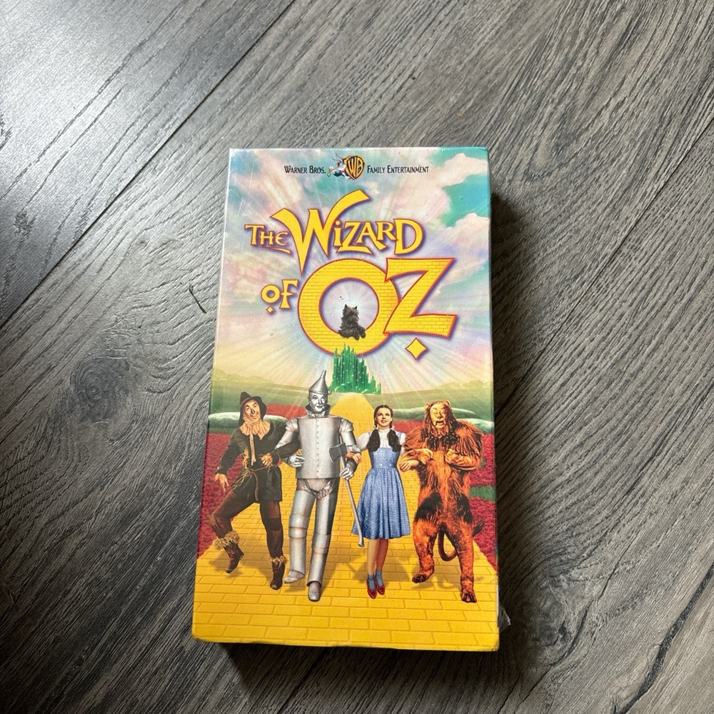 Vibrant Yellow and Blue VHS Tape with Iconic Wizard Of Oz Cover